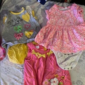 Vibrant Pink and Yellow Bodysuits for Playful Days